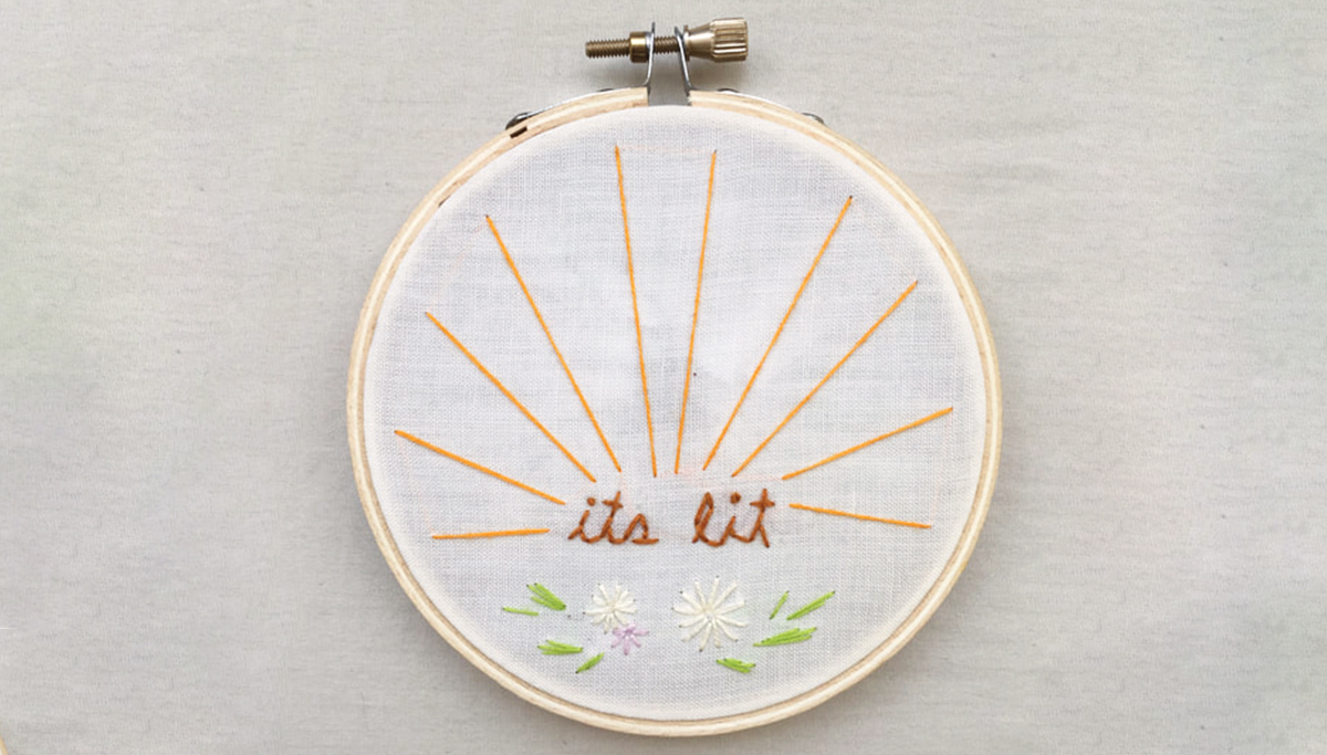 embroidery hoop saying "its lit"